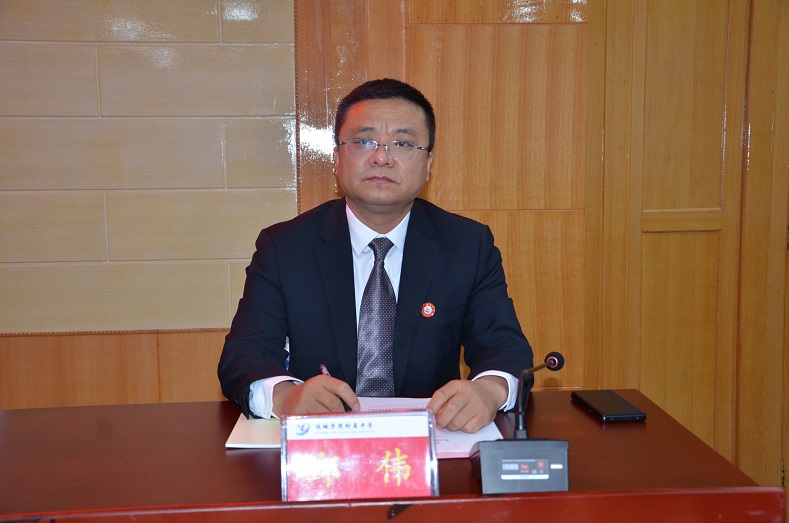 党政办主任代表学校作财务工作报告.JPG
